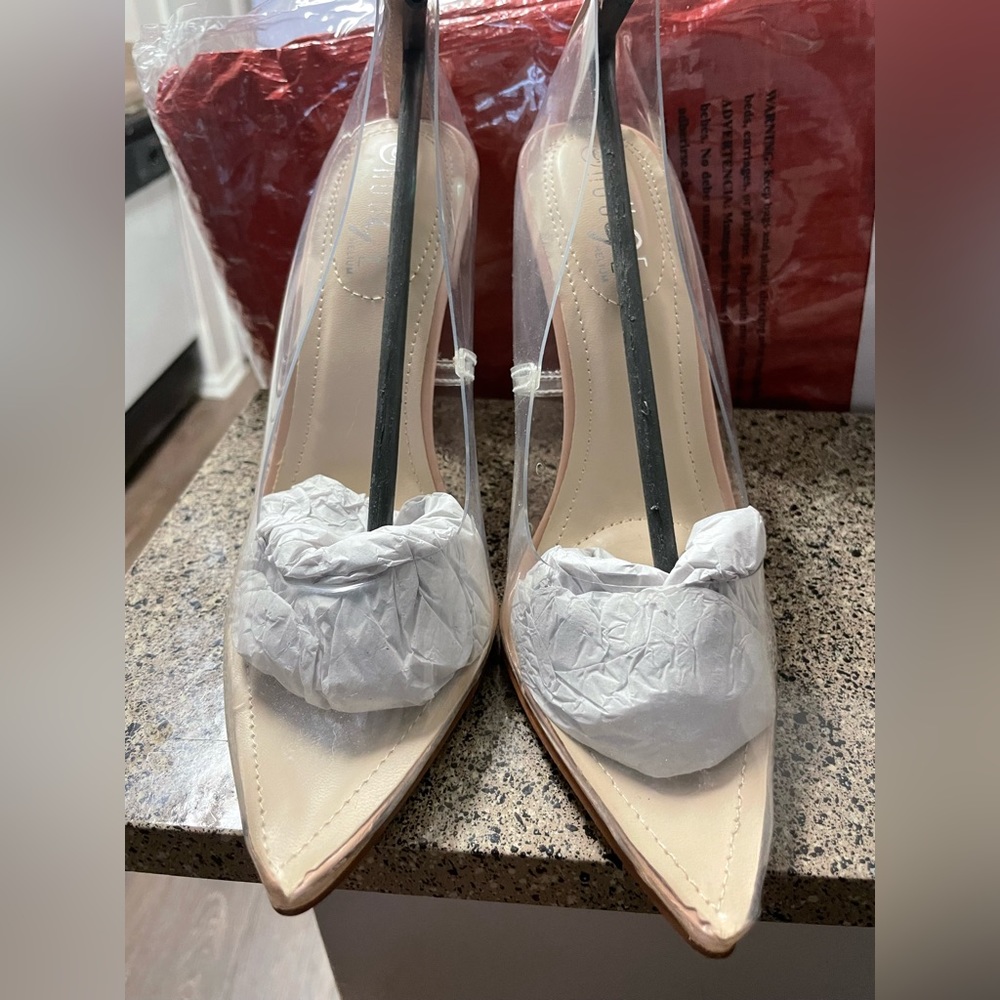 Clear high heels size 6